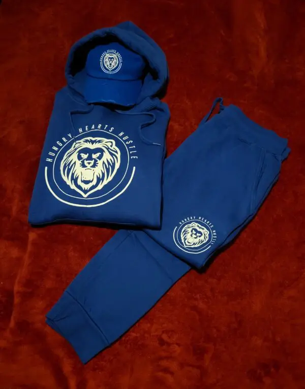 A blue outfit with a white lion logo on it.