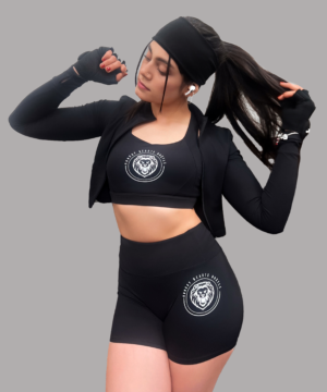 Stylish woman in black athletic wear. - 3994