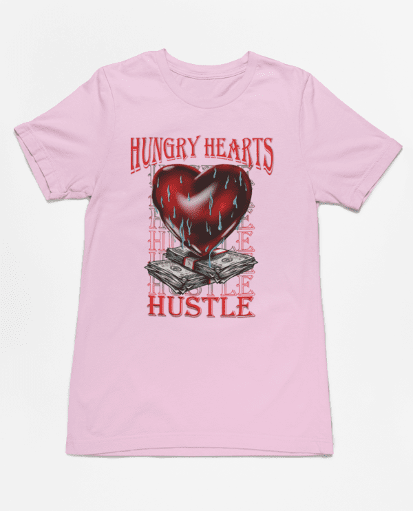 A pink t-shirt with an image of a heart on it.