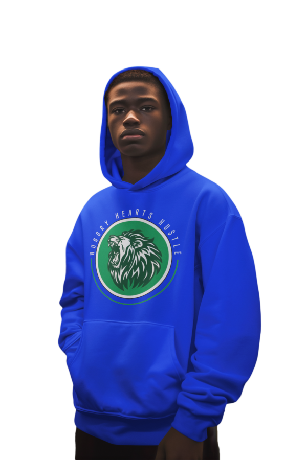 A man wearing a blue hoodie with a green and white logo.