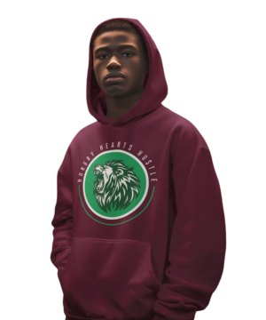 A man wearing a maroon hoodie with green and white logo.