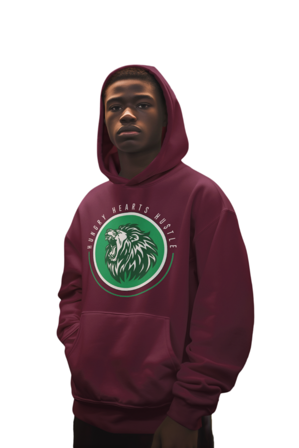 A man wearing a maroon hoodie with green and white logo.